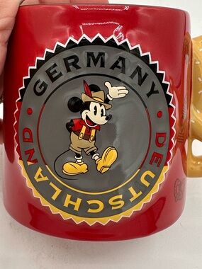 Disney Epcot World Mickey Germany Deutschland coffee mug with a pretzel handle